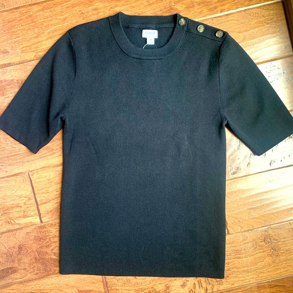 Women’s black basic crew top with button detail